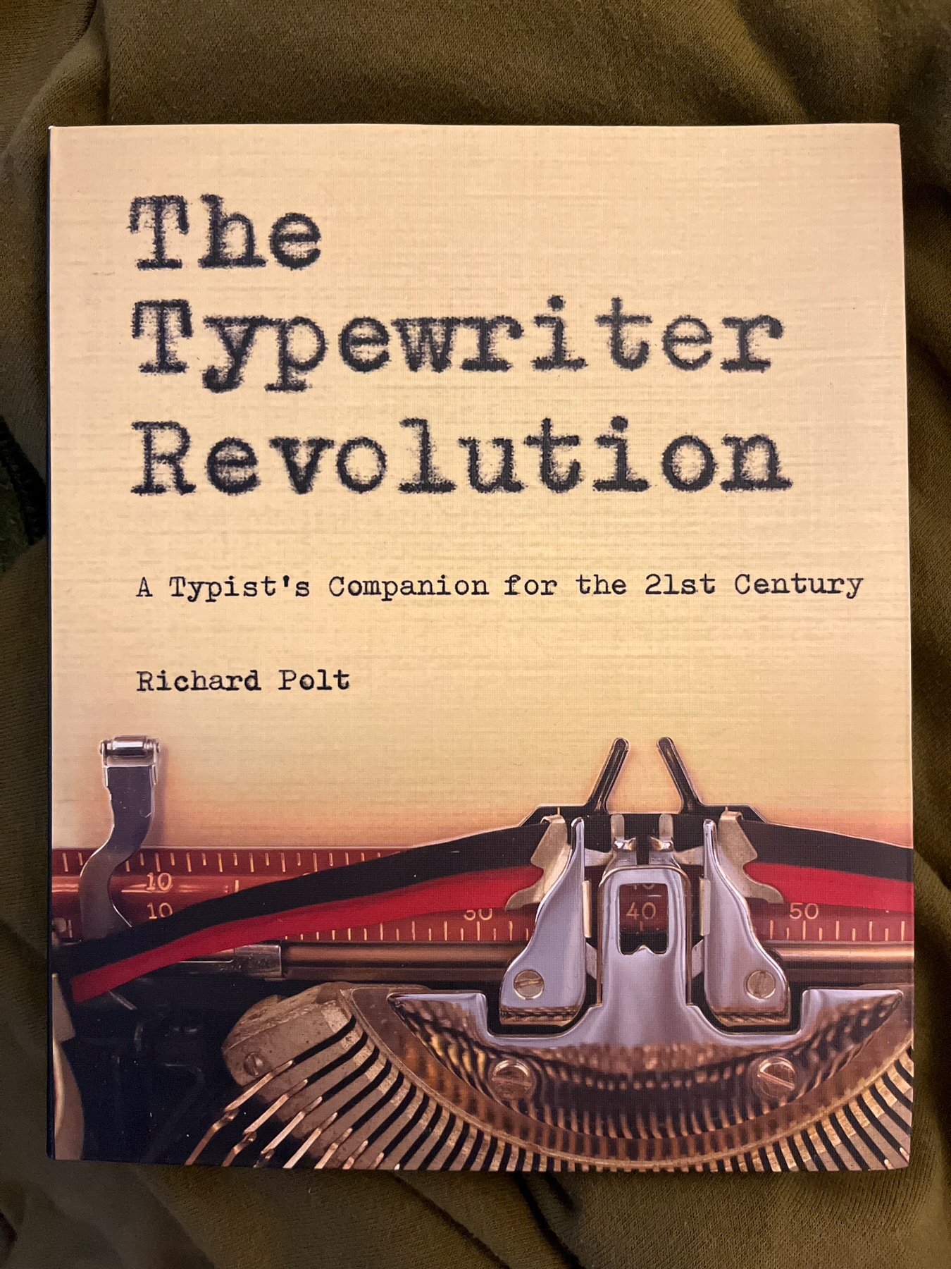 The image shows the cover of a book titled "The Typewriter Revolution: A Typist's Companion for the 21st Century" by Richard Polt. The cover features an image of a typewriter.